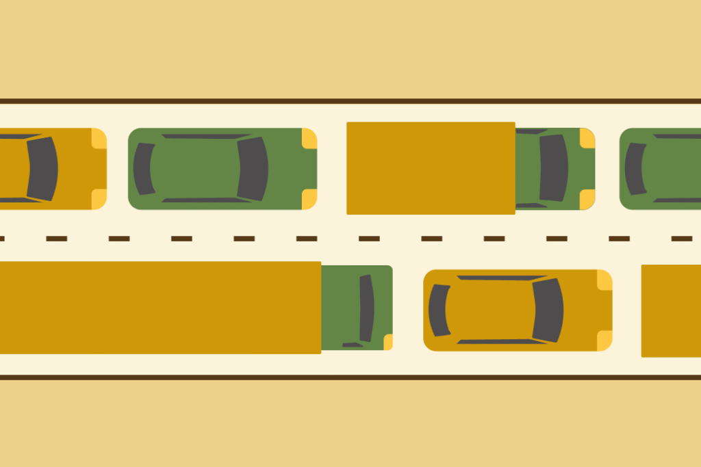 Auto’s in de file die het belang van automatiseren illustreren.